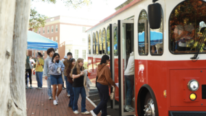 A trolley circled the route between Mary Washington’s Double Drive and the City of Fredericksburg’s Dorothy Hart Community Center, carrying students to submit their ballots. Photo by Karen Pearlman.